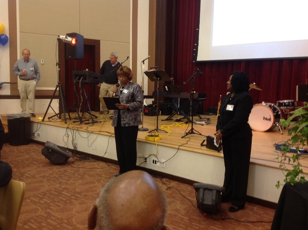 Emma Sessoms welcoming and introducing our former Faculty members. Announcements by Lou Parker Jones-Hill.