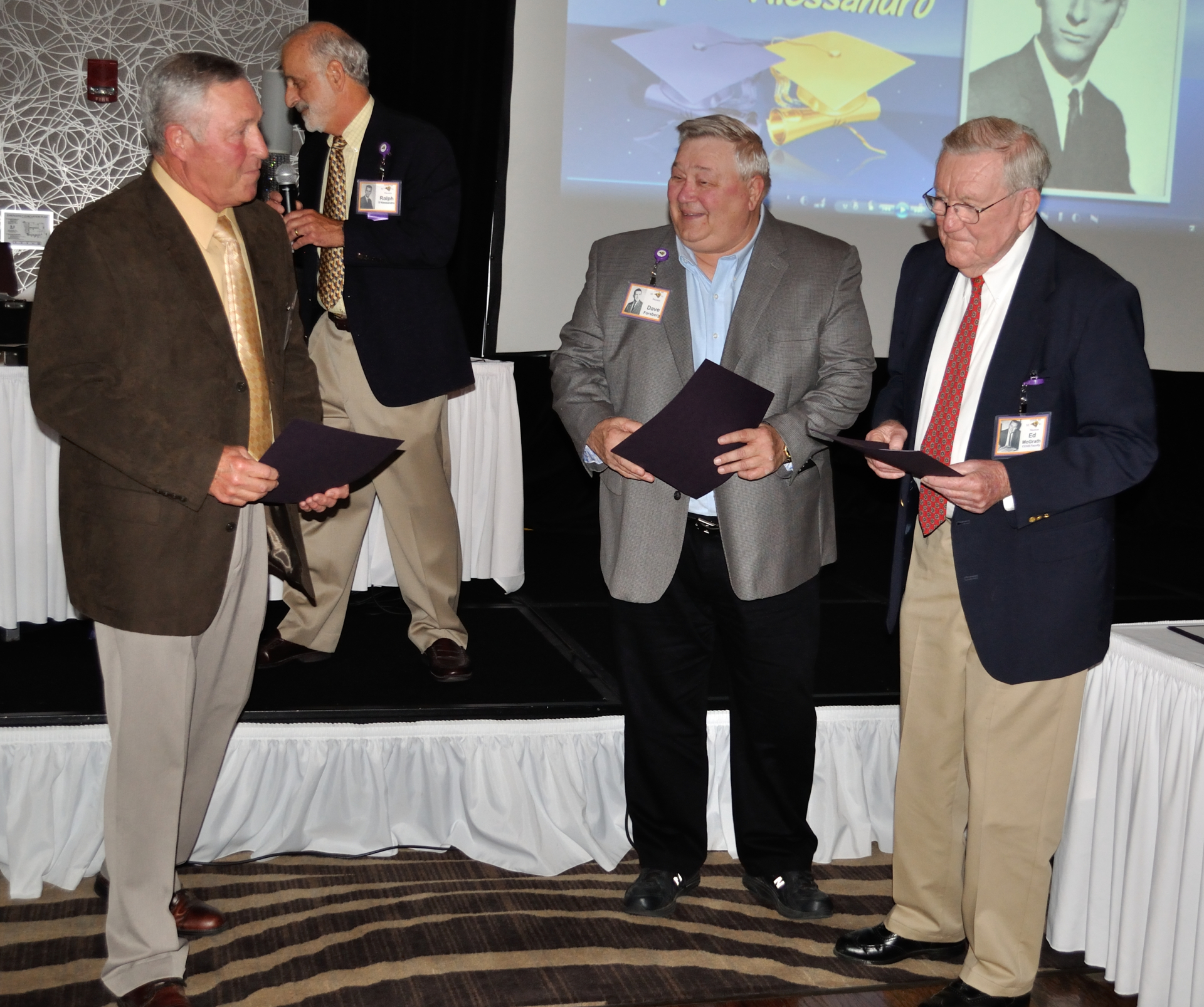 Bob Lawson, Dave Forsberg, Coach McGrath: Sports Awards