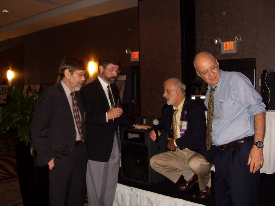 The Brain Trust STILL Contemplating the Logistics of the Class Photo